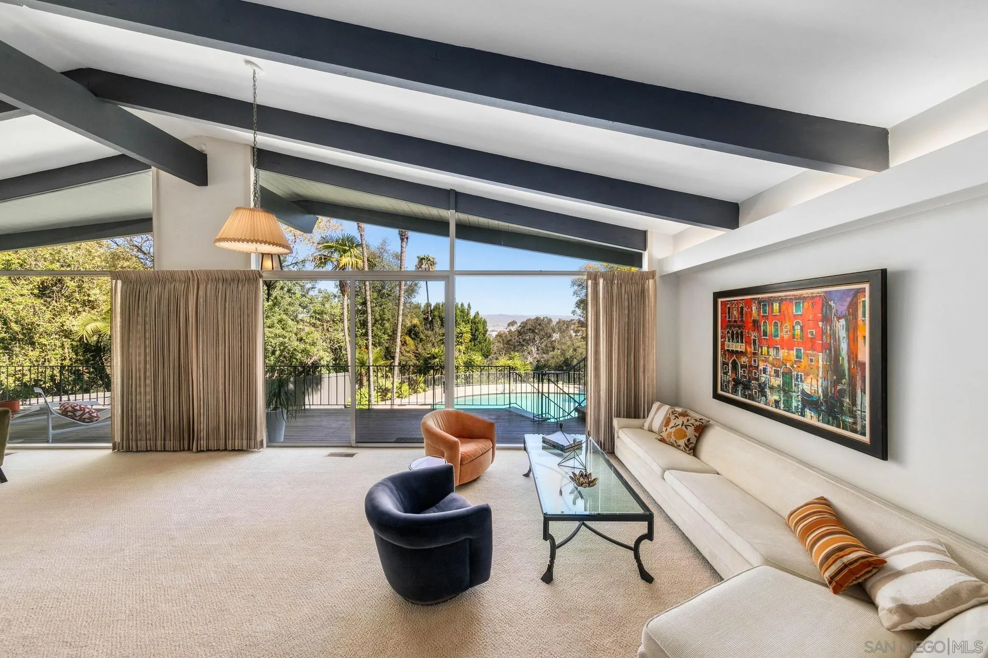 10446 Russell Road La Mesa, CA 91941 - Photo 9 of 75 a living room with furniture and a flat screen tv