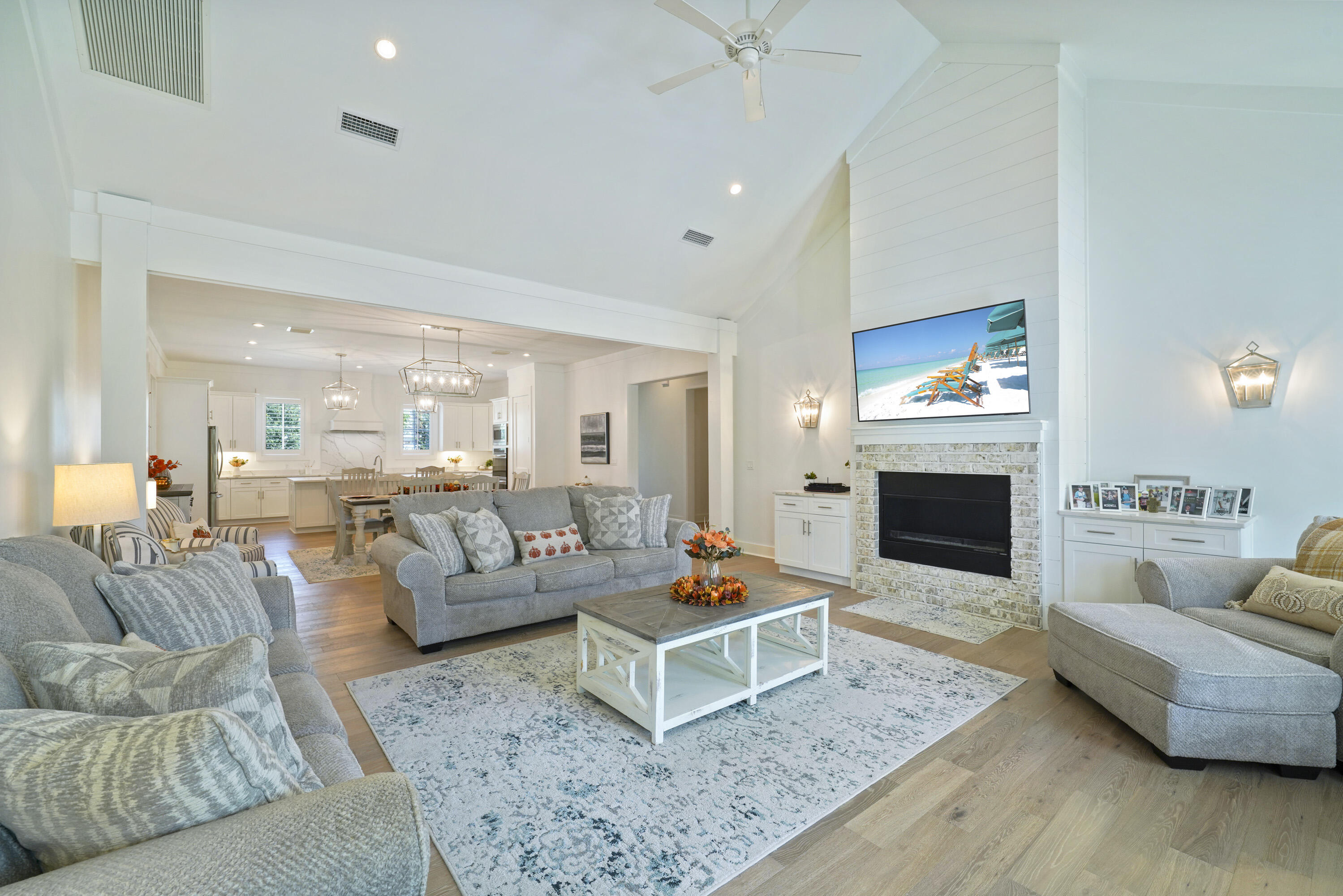 76 Tanglewood Drive Santa Rosa Beach, FL 32459 - Photo 30 of 94 a living room with furniture and a fireplace