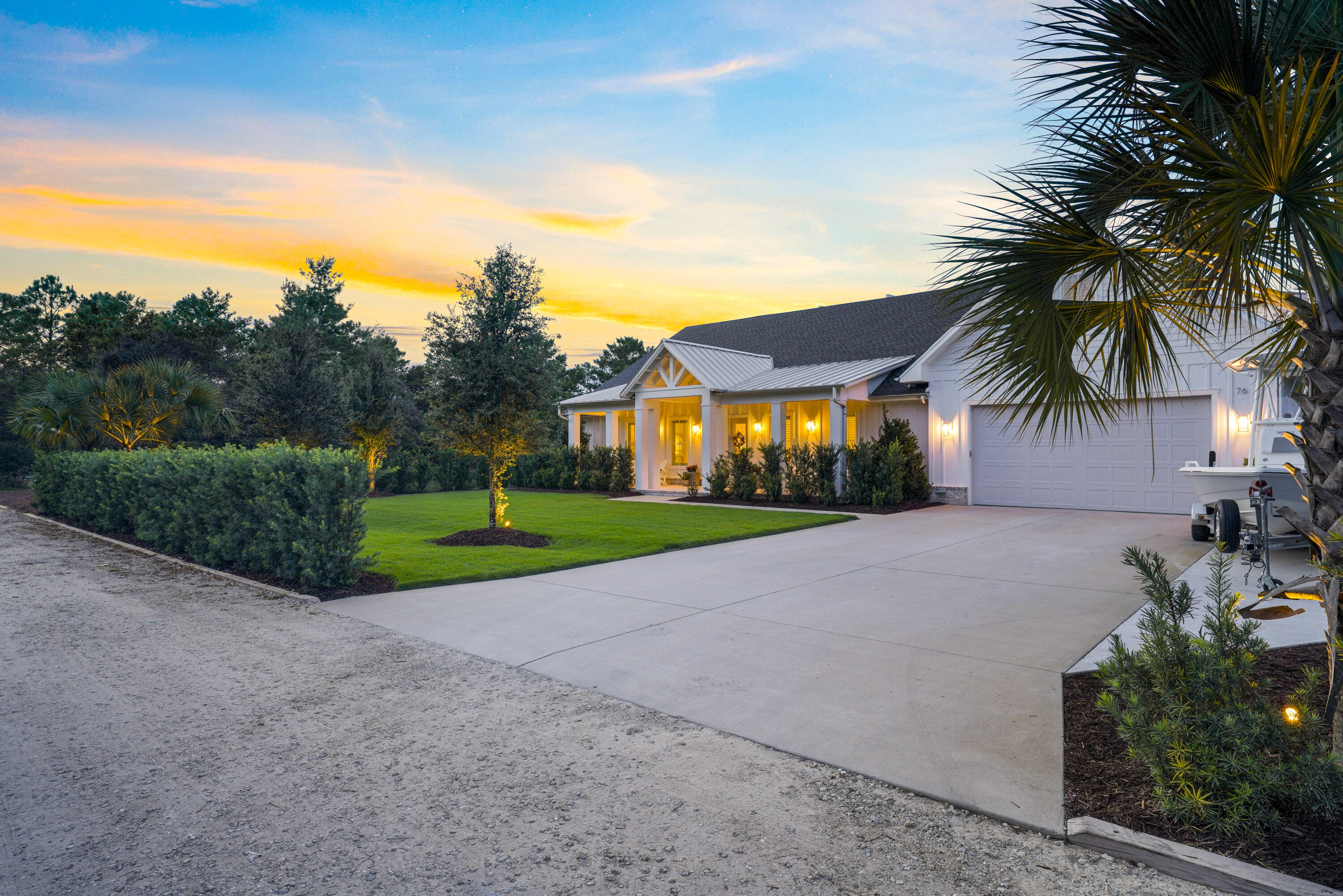 76 Tanglewood Drive Santa Rosa Beach, FL 32459 - Photo 4 of 94 a view of a house with a yard and potted plants