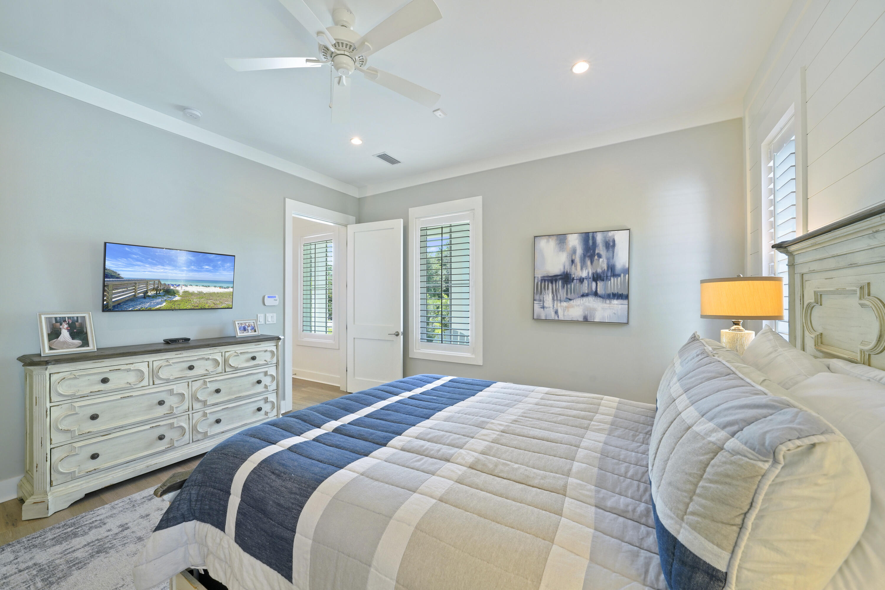 76 Tanglewood Drive Santa Rosa Beach, FL 32459 - Photo 54 of 94 a bedroom with a bed and a television