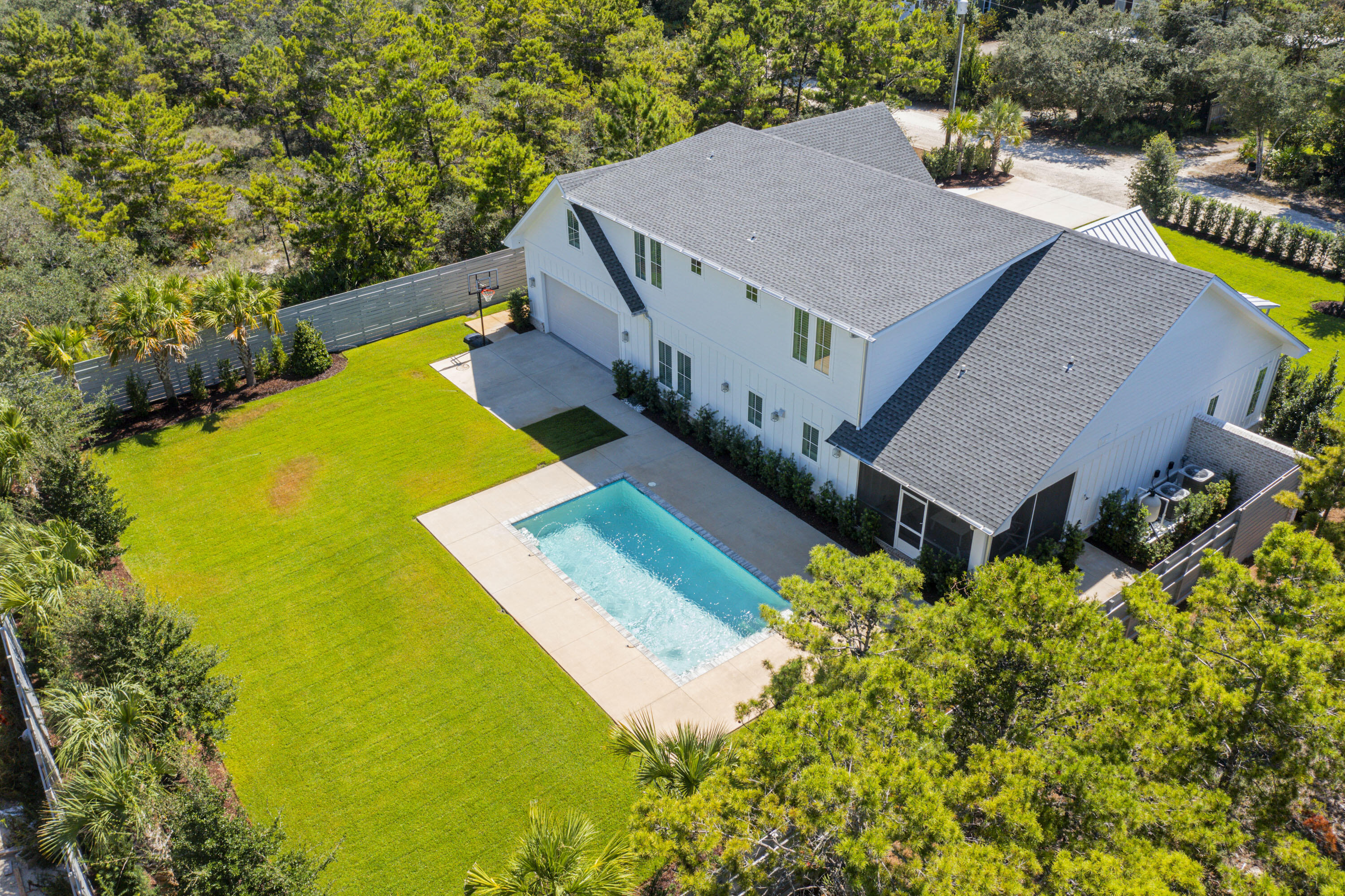 76 Tanglewood Drive Santa Rosa Beach, FL 32459 - Photo 84 of 94 an aerial view of a house with swimming pool