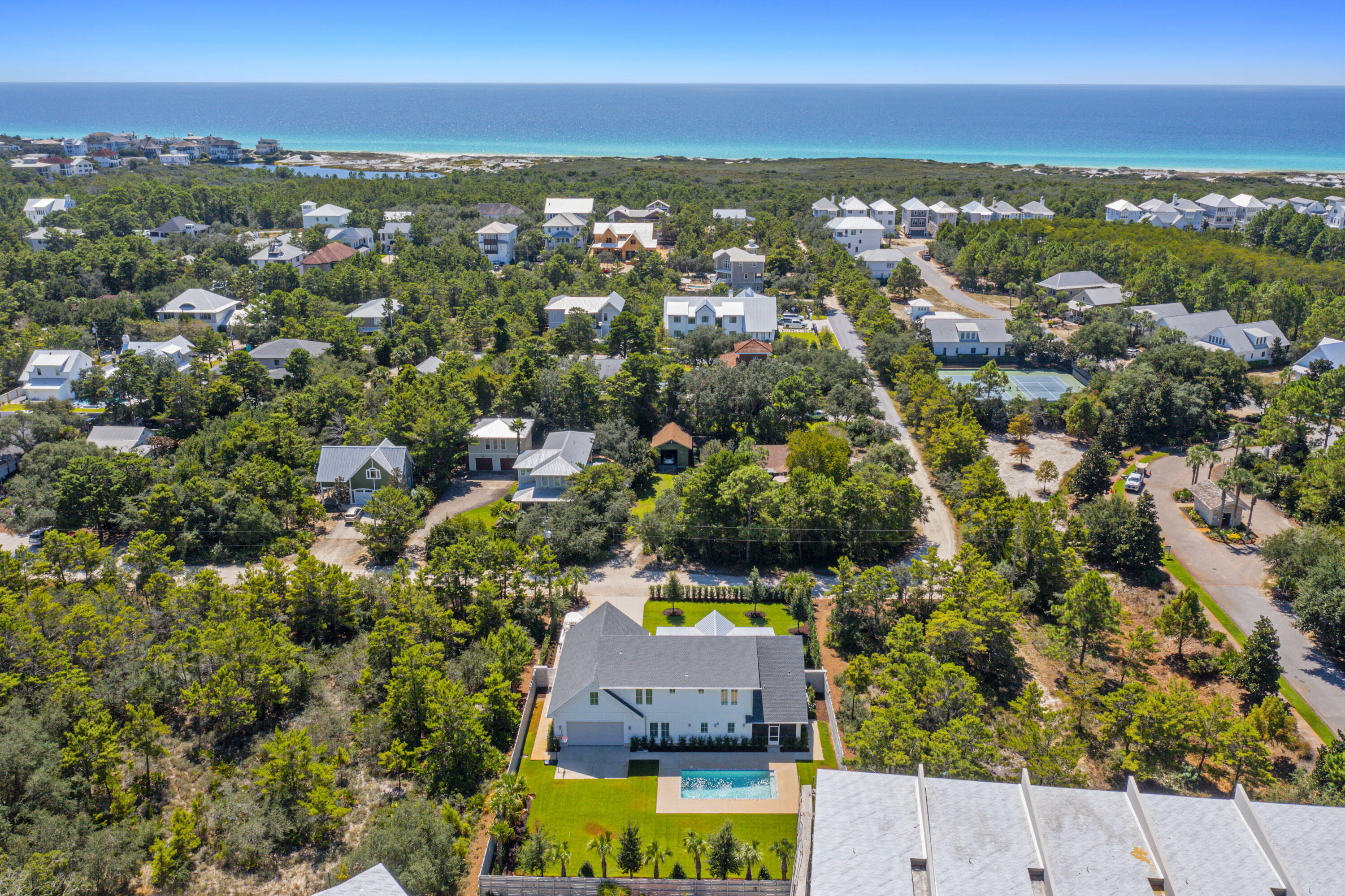 76 Tanglewood Drive Santa Rosa Beach, FL 32459 - Photo 89 of 94 an aerial view of residential houses with outdoor space and ocean view