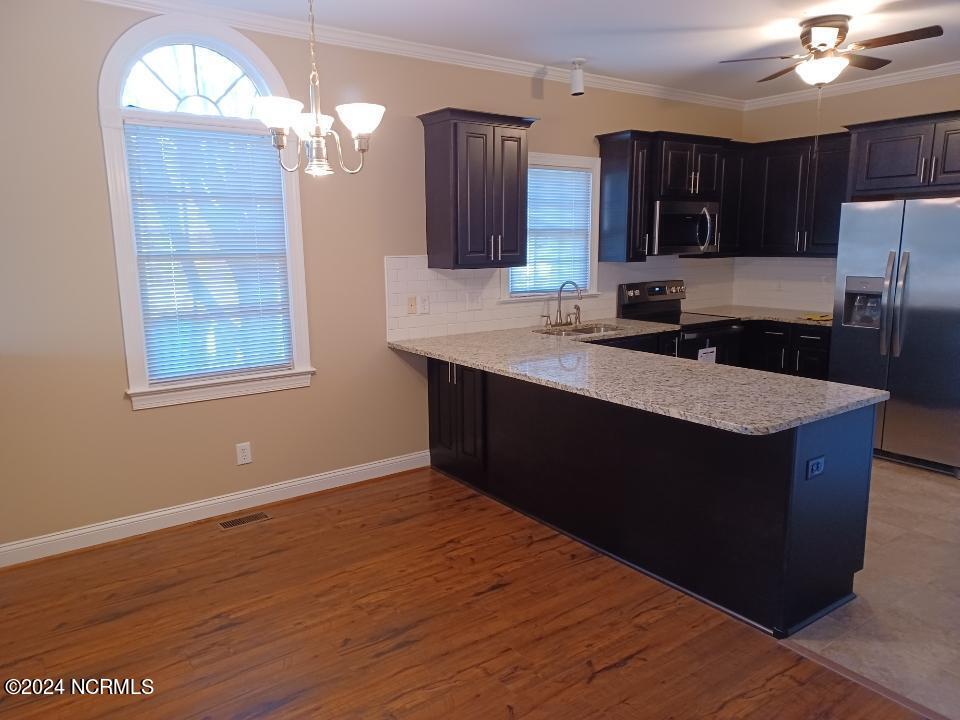 606 Spring Forest Road, Unit B Greenville, NC 27834 - Photo 3 of 4 Open dining area