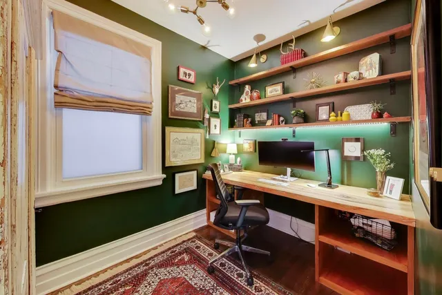 a room with furniture and a potted plant