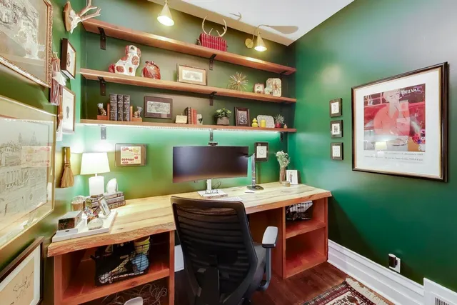 a view of a workspace with furniture