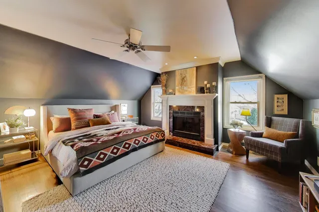 a bedroom with a bed and a couch