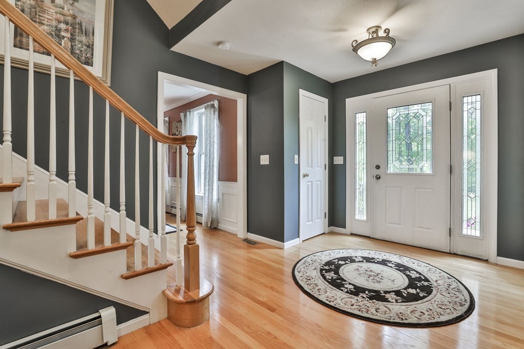 5 Hancock Road Windham, NH 03087 - Photo 3 of 41 a view of a livingroom with furniture and entryway
