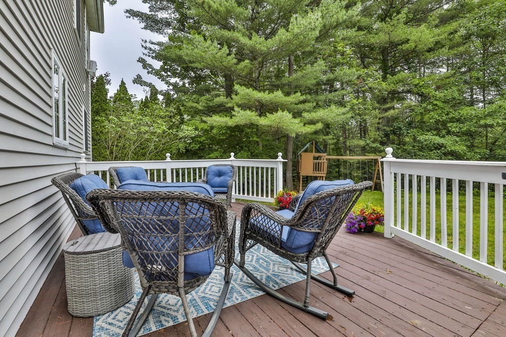 5 Hancock Road Windham, NH 03087 - Photo 36 of 41 a view of balcony with furniture and trees