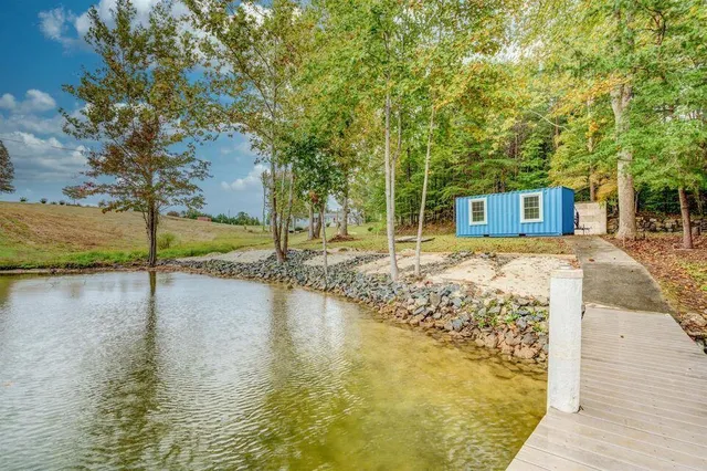 a view of a swimming pool with a patio