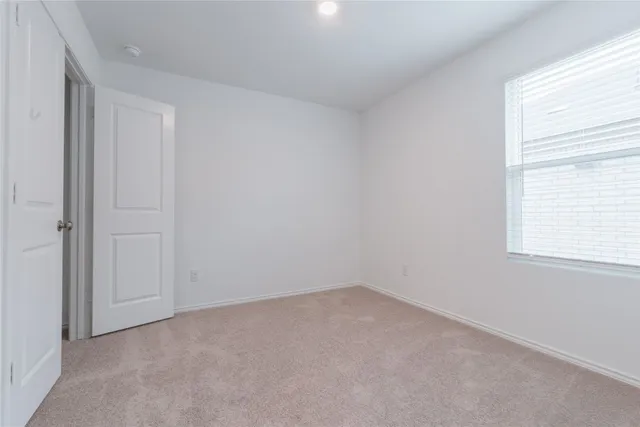 a bathroom with a bathtub and toilet
