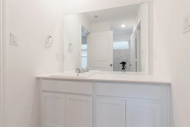 an empty room with cabinet door