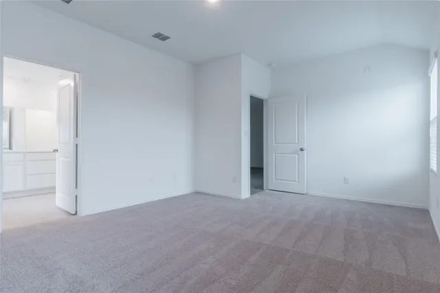 a bathroom with a bathtub and a sink