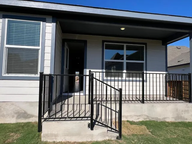 a front view of a house having yard