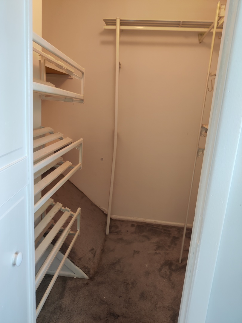 2526 Berkshire Court, Unit 2526 Waukegan, IL 60087 - Photo 11 of 16 a view of an empty walk in closet