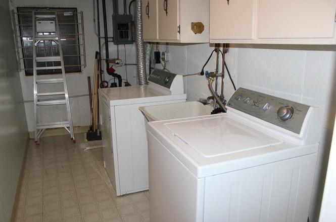 2526 Berkshire Court, Unit 2526 Waukegan, IL 60087 - Photo 14 of 16 a utility room with dryer and washer