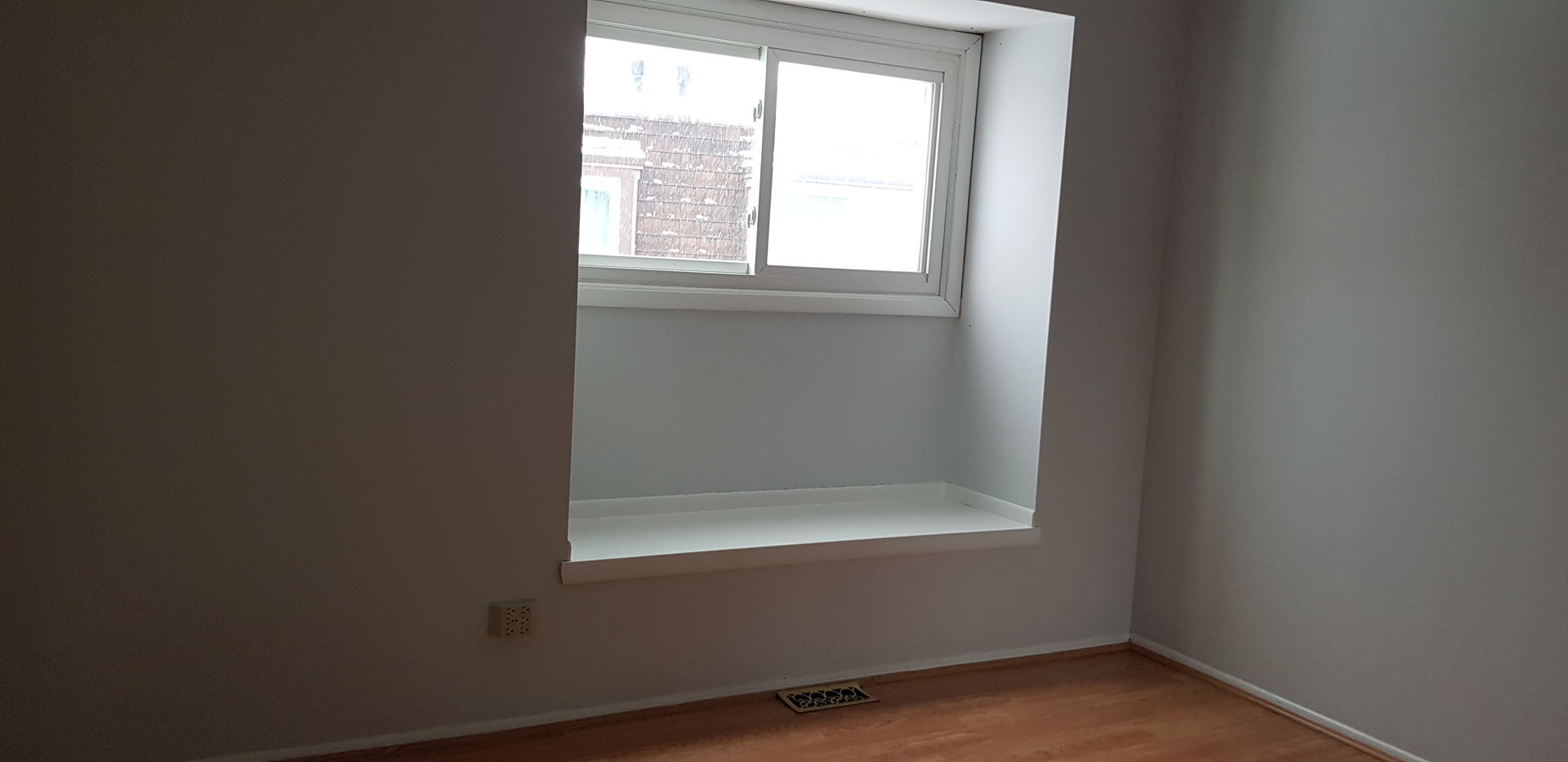 2526 Berkshire Court, Unit 2526 Waukegan, IL 60087 - Photo 8 of 16 an empty room with a window