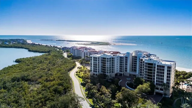 a view of lake with a yard