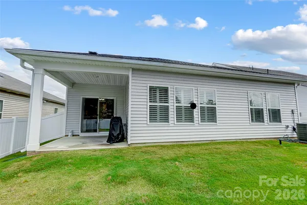a view of yard and swimming pool