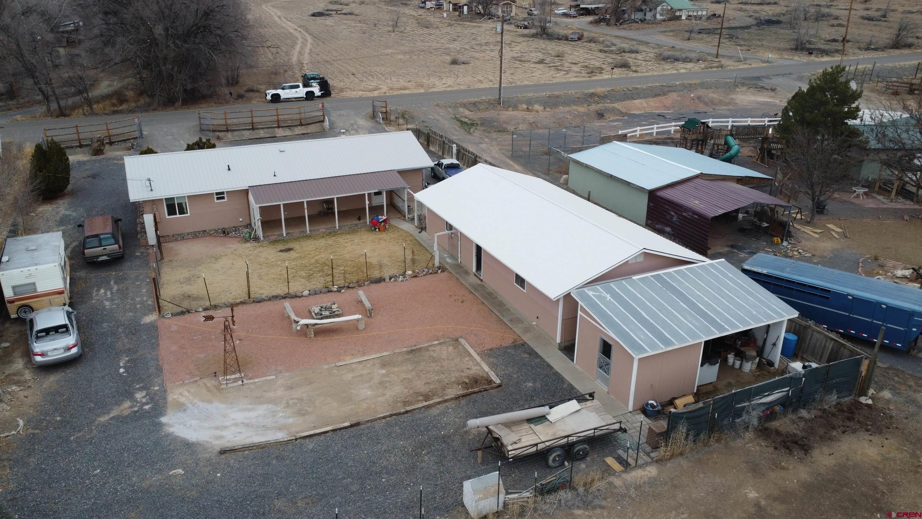 20268 Fairview Road Austin, CO 81410 - Photo 4 of 19 an aerial view of a house with a yard and sitting space