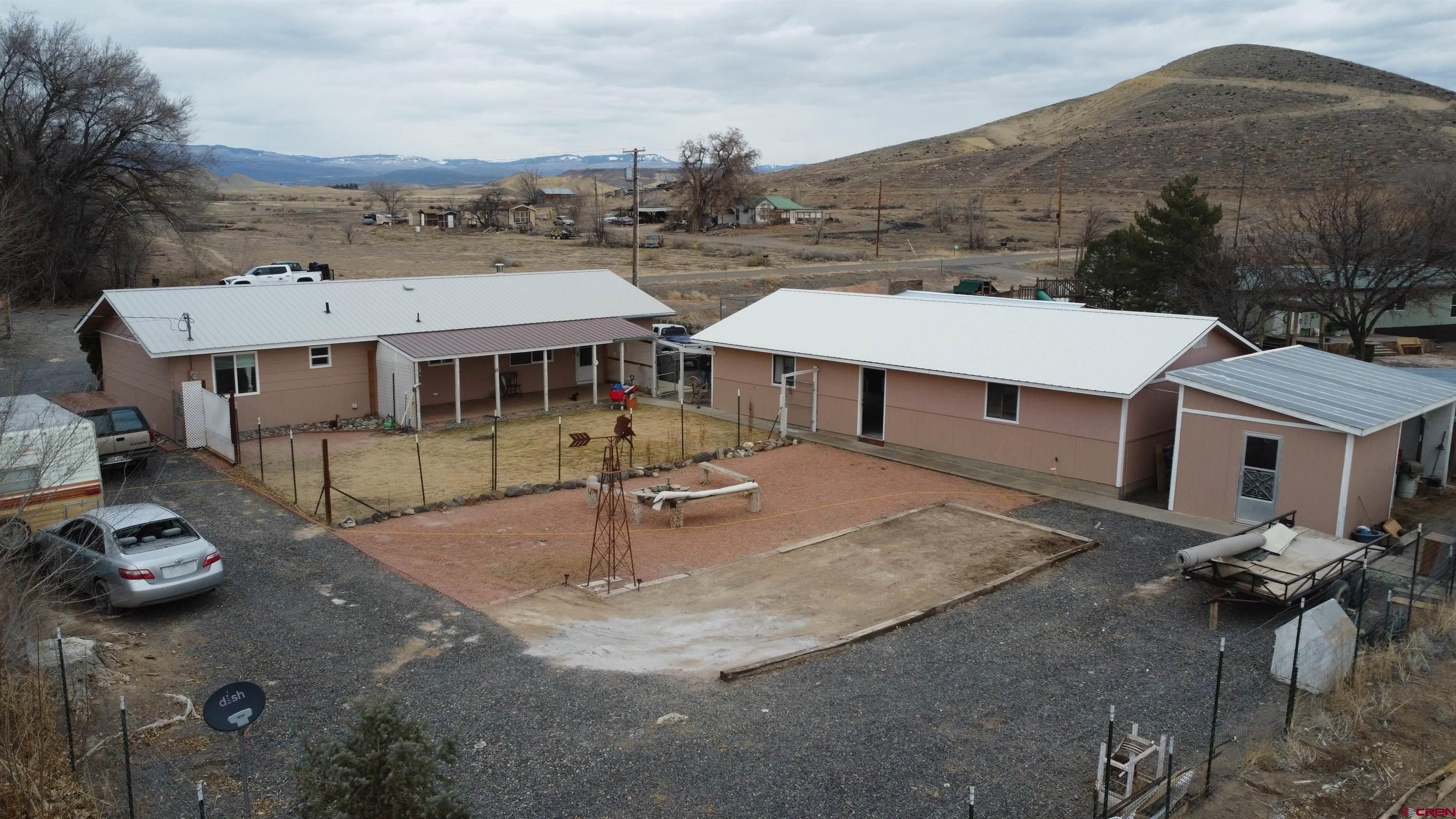 20268 Fairview Road Austin, CO 81410 - Photo 5 of 19 an aerial view of a house with garden space