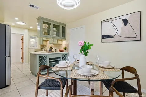 a view of a dining room with furniture