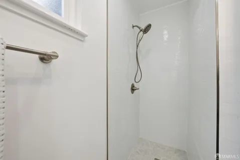 a swimming pool with wooden fence