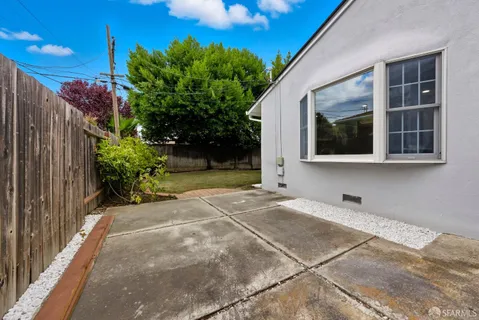 a view of a garden with a fountain