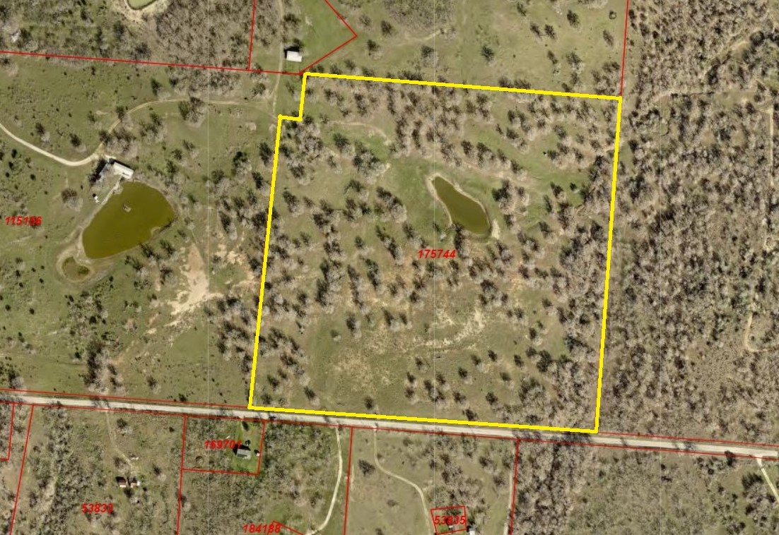 Tbd Nash Creek Road Kingsbury, TX 78638 - Photo 27 of 31 a bathroom with a shower curtain