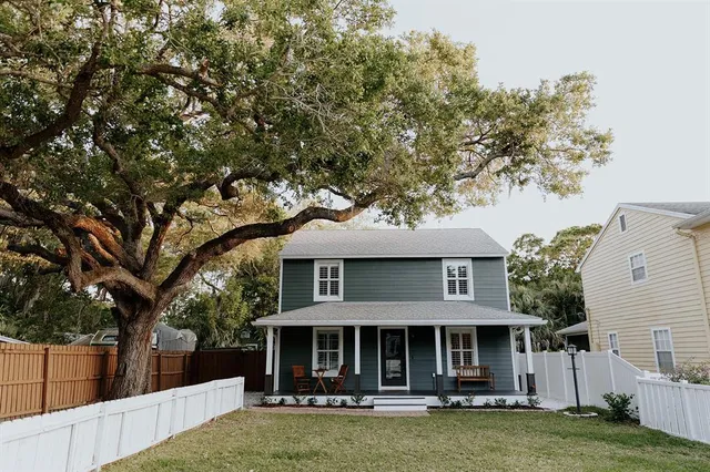 front view of a house with a yard