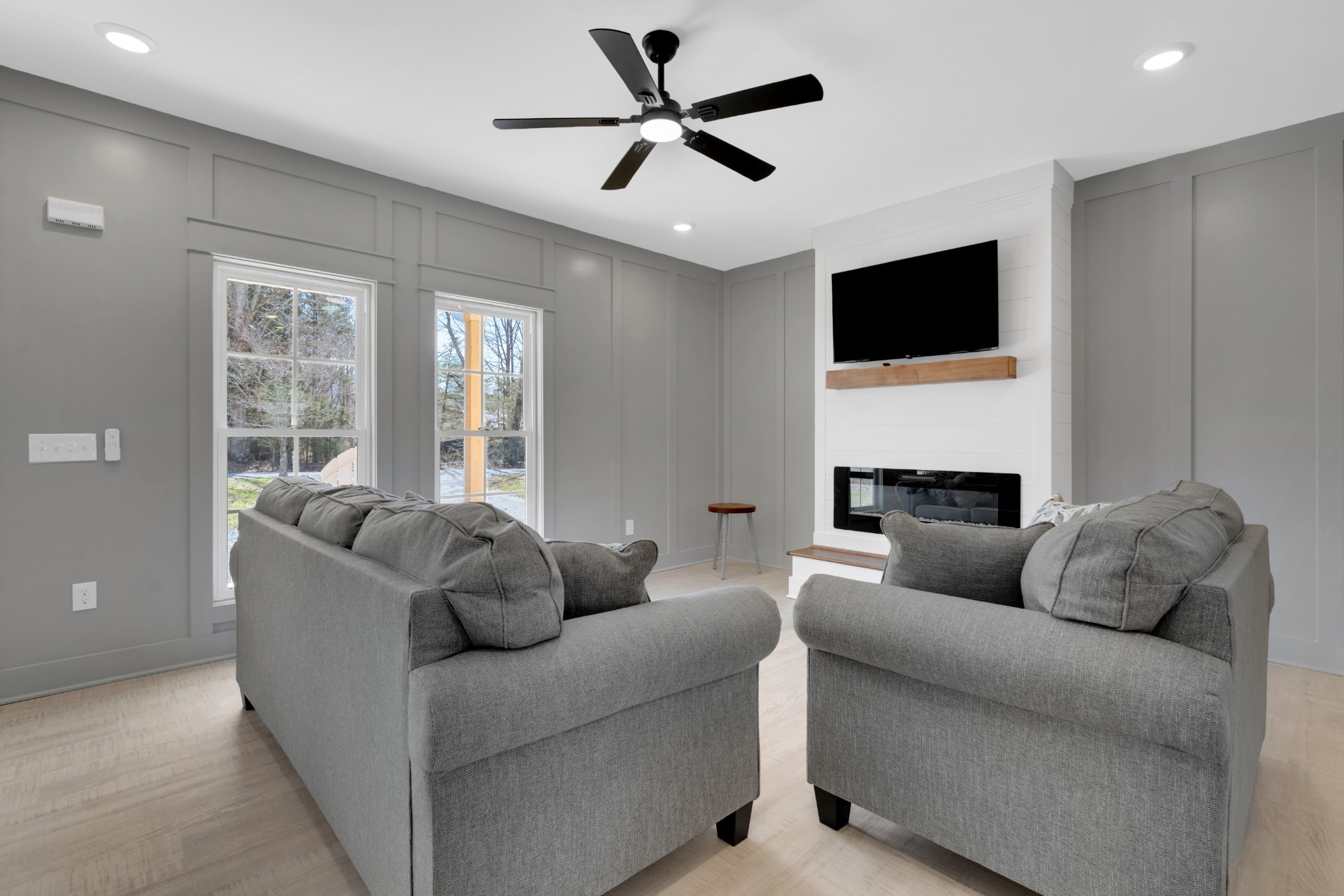 591 Ghea Road Normandy, TN 37360 - Photo 21 of 48 a living room with furniture a fireplace and a flat screen tv