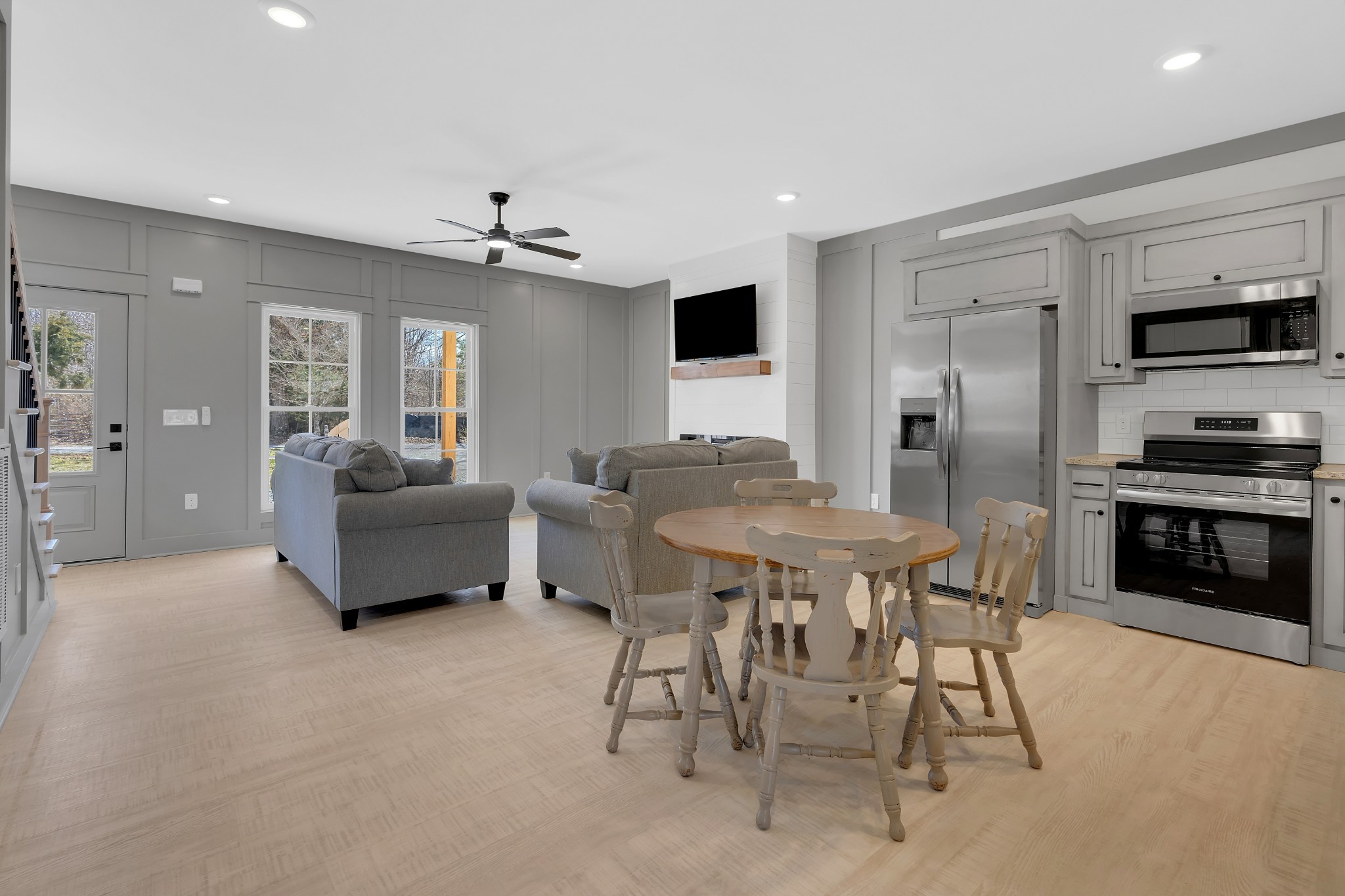 591 Ghea Road Normandy, TN 37360 - Photo 26 of 48 a dining room with furniture a chandelier and kitchen view