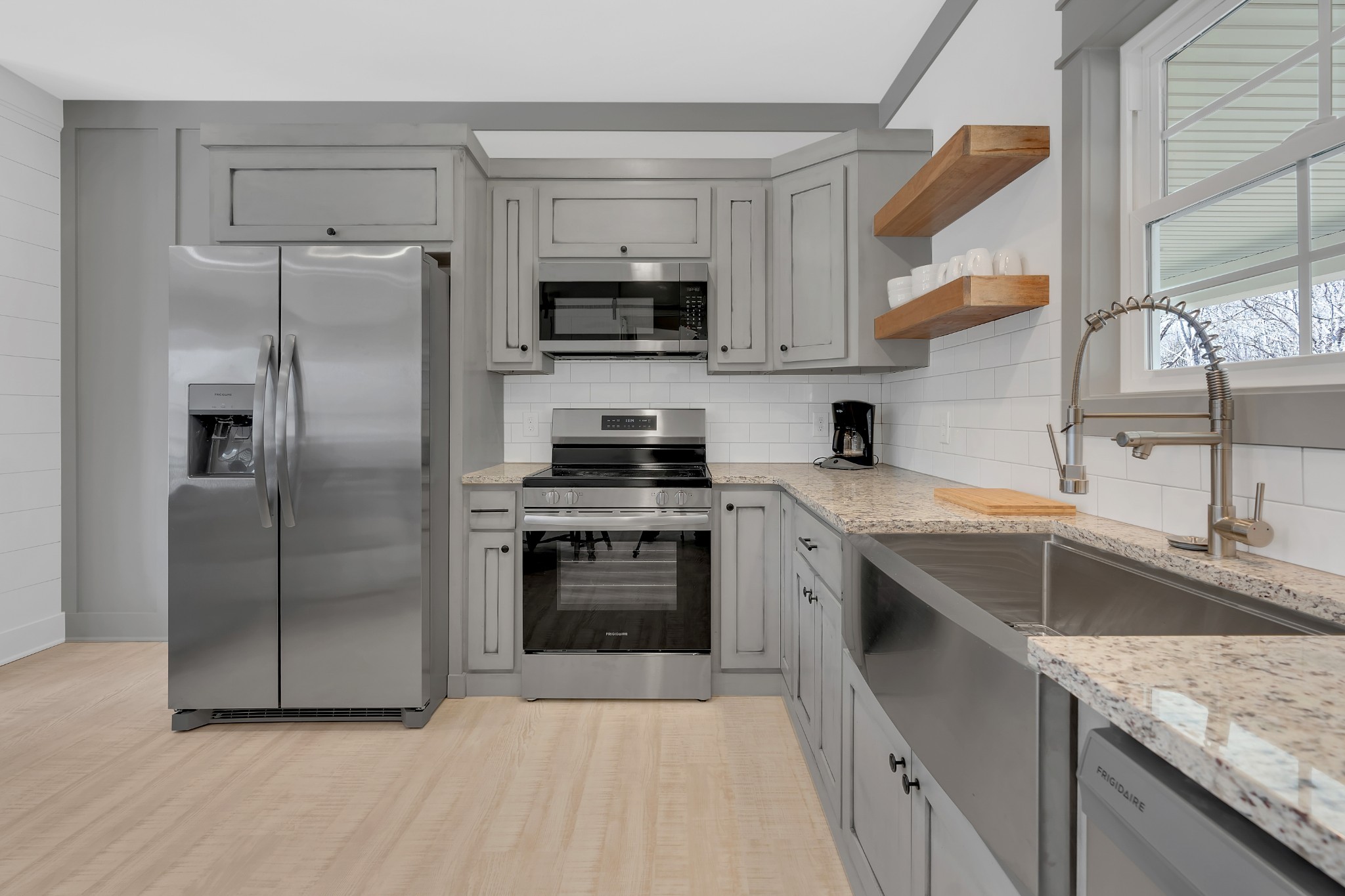 591 Ghea Road Normandy, TN 37360 - Photo 29 of 48 a kitchen with stainless steel appliances granite countertop a refrigerator and a sink