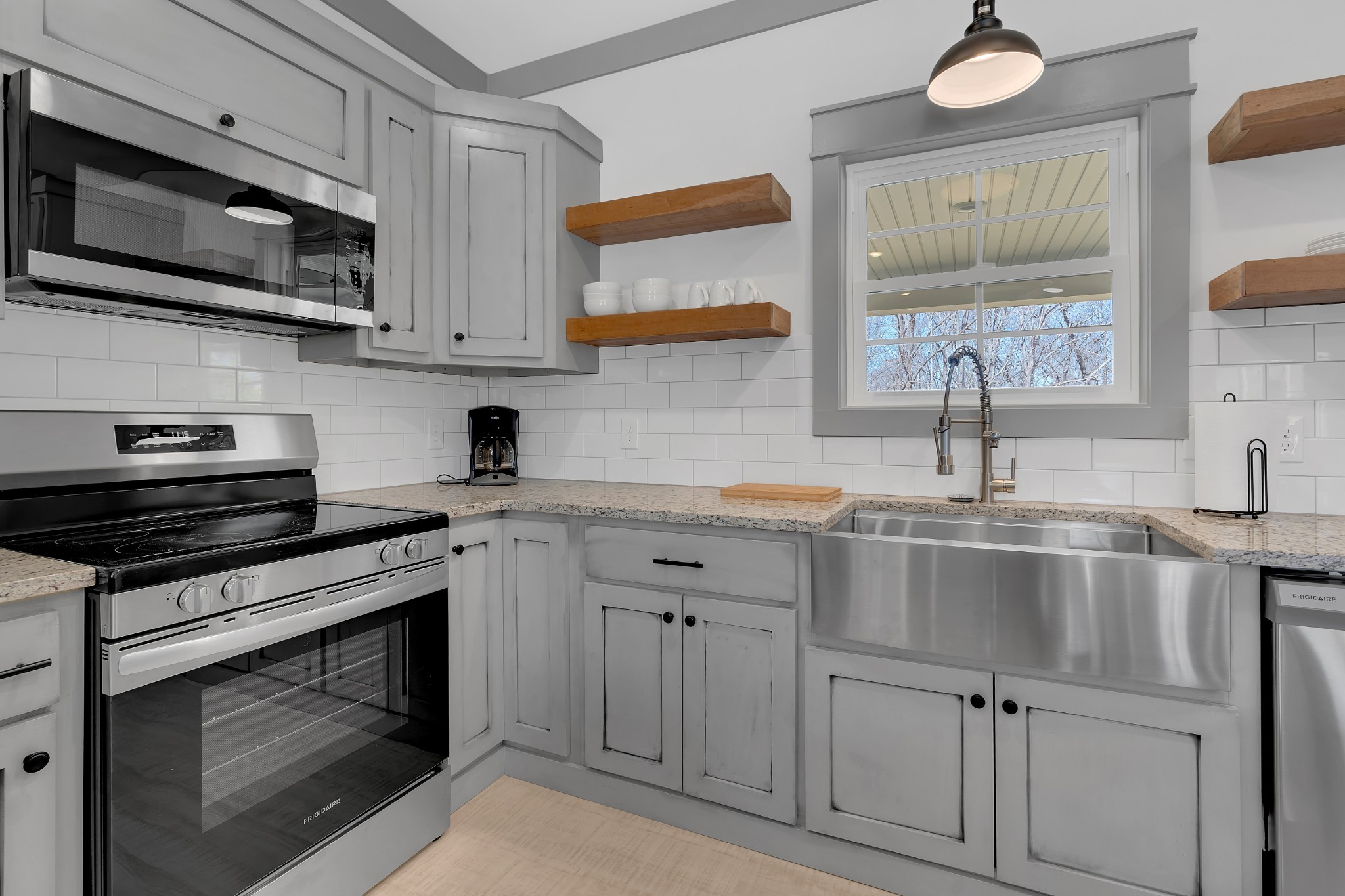 591 Ghea Road Normandy, TN 37360 - Photo 31 of 48 a kitchen with cabinets appliances and a sink