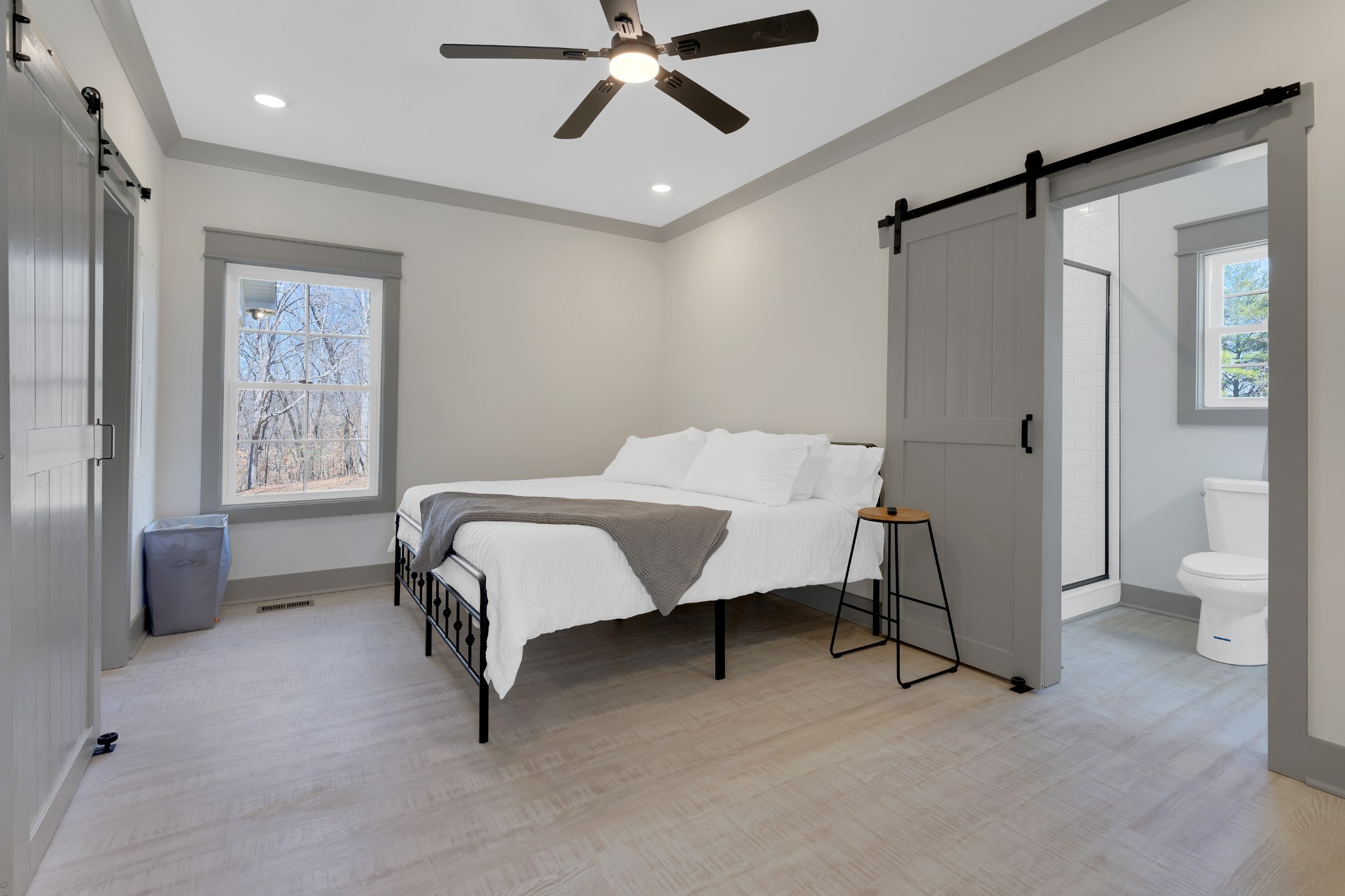 591 Ghea Road Normandy, TN 37360 - Photo 34 of 48 a bedroom with a bed and a chandelier