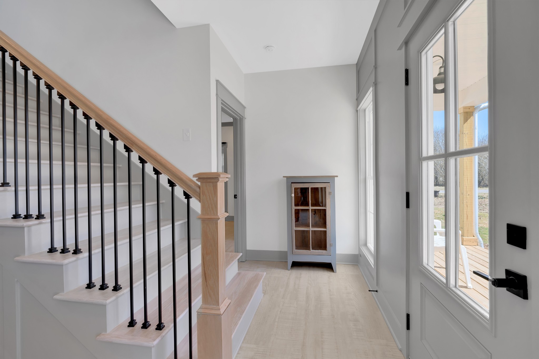 591 Ghea Road Normandy, TN 37360 - Photo 40 of 48 a view of a hallway with windows and stairs