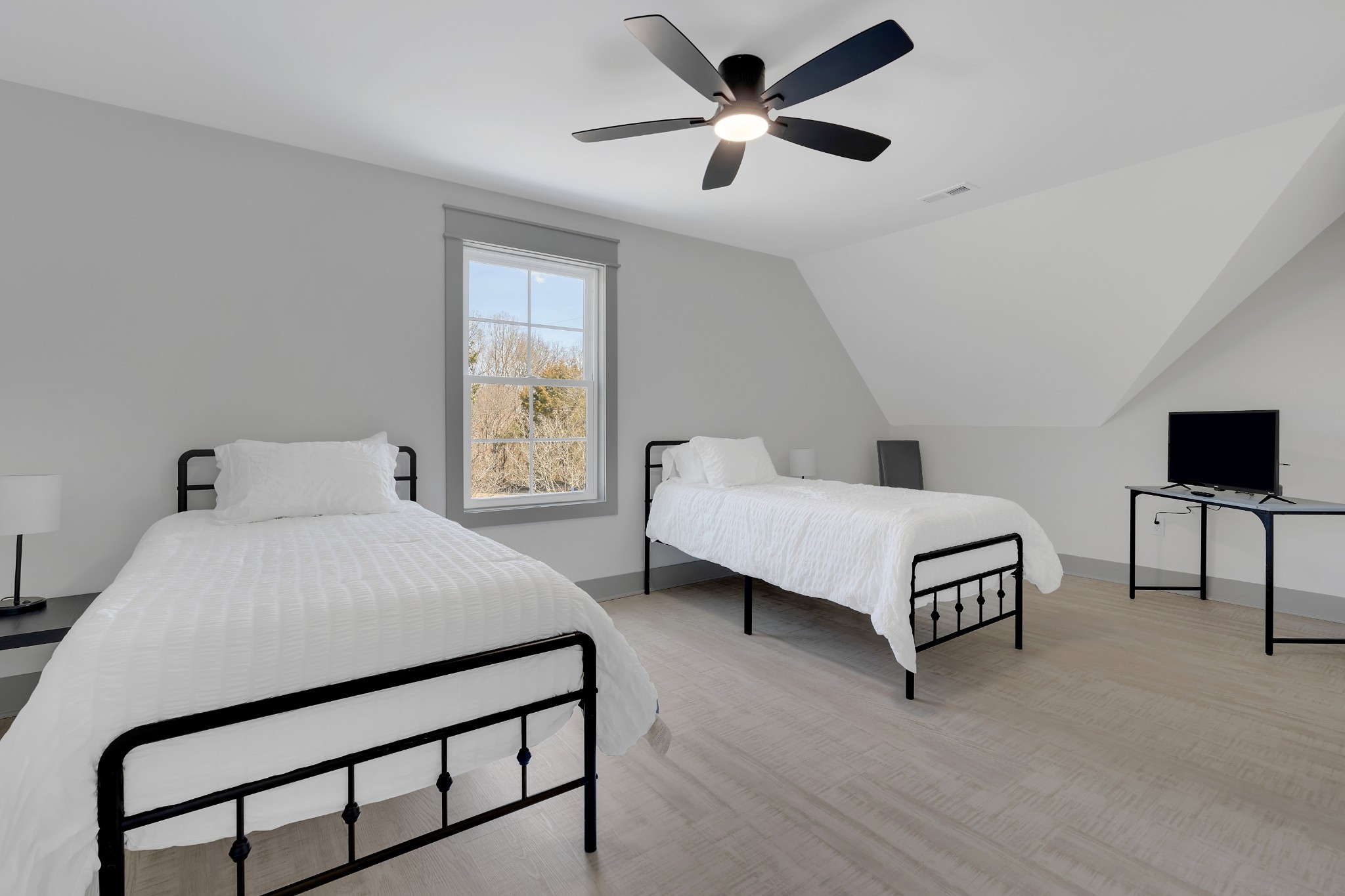 591 Ghea Road Normandy, TN 37360 - Photo 41 of 48 a bedroom with a bed and a chandelier