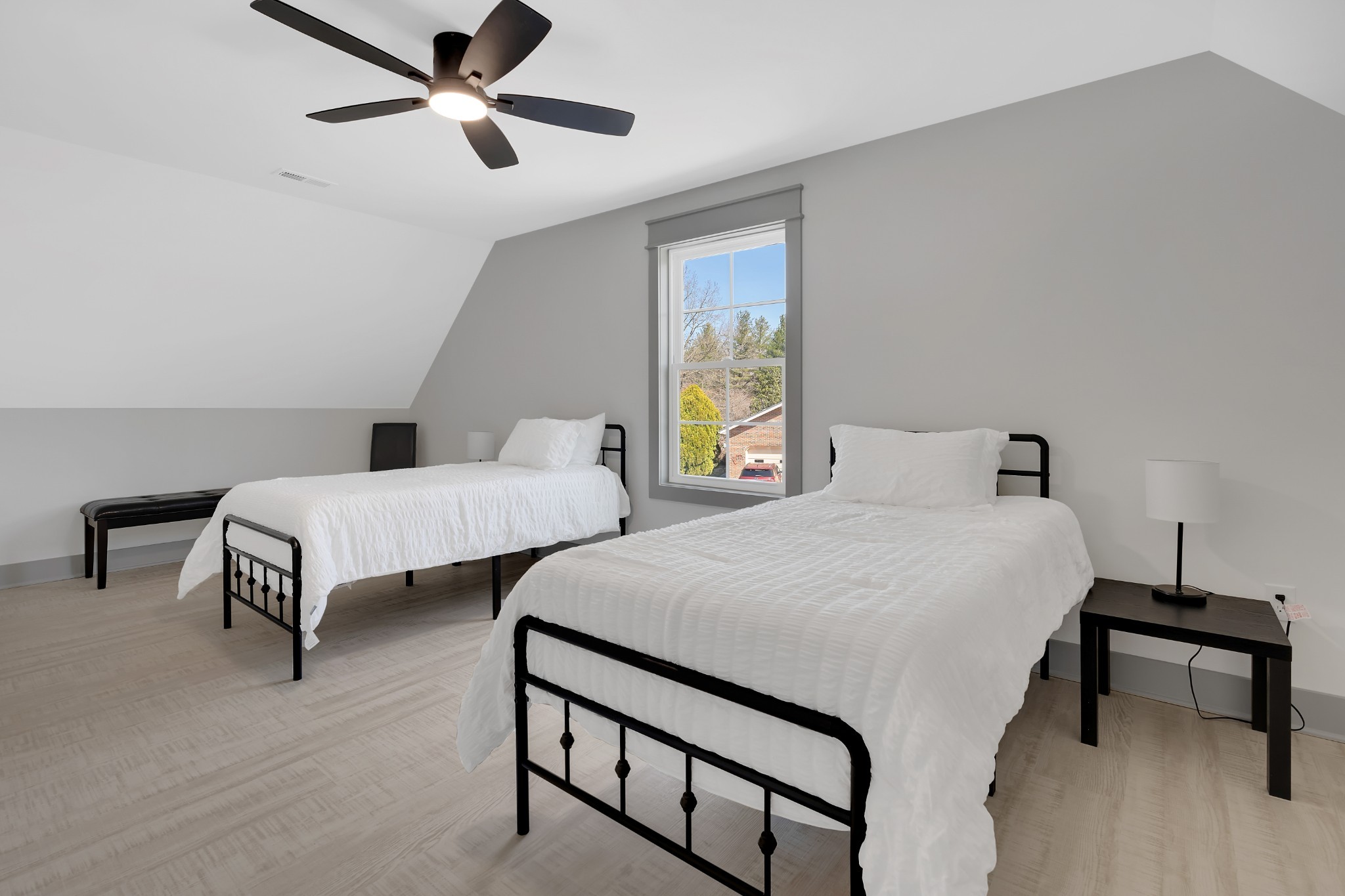 591 Ghea Road Normandy, TN 37360 - Photo 42 of 48 a bedroom with 2 bed and a chandelier