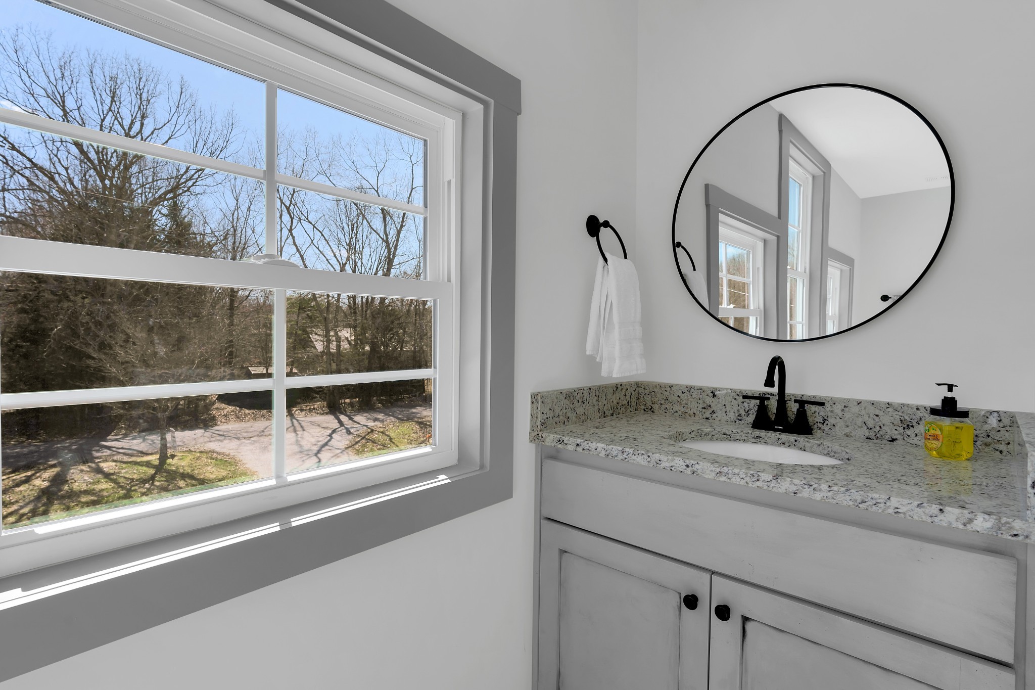 591 Ghea Road Normandy, TN 37360 - Photo 47 of 48 a bathroom with a sink and a mirror