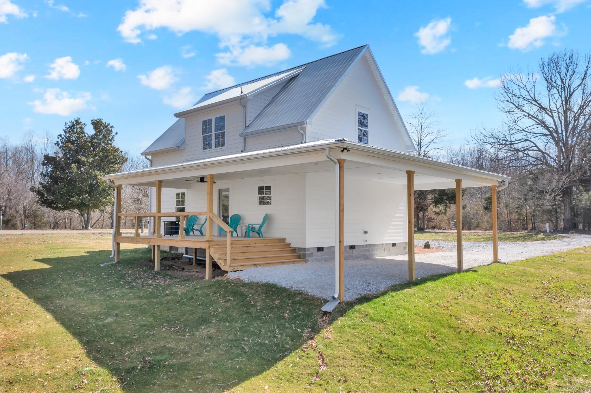 591 Ghea Road Normandy, TN 37360 - Photo 6 of 48 a view of a house with backyard and chairs