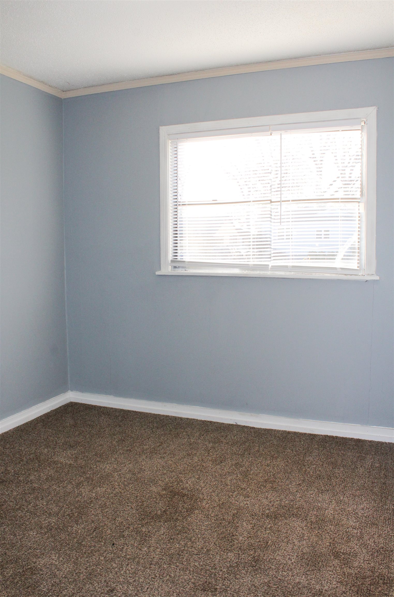 1576 Railton Road Memphis, TN 38111 - Photo 6 of 12 an empty room with a window