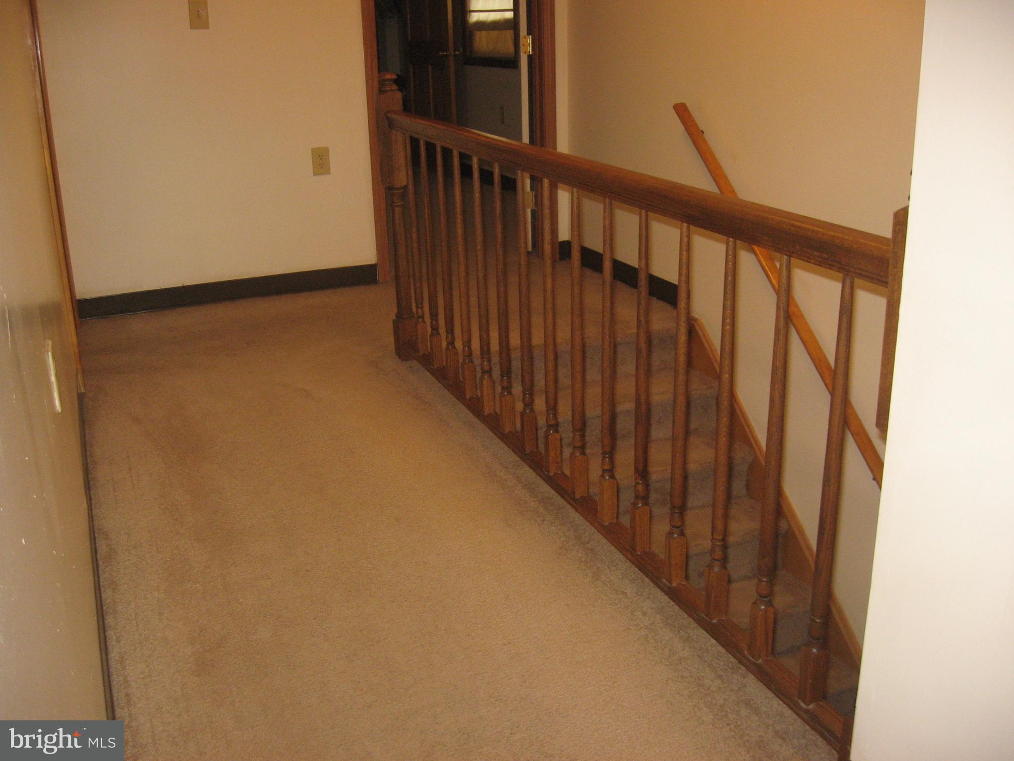 5894 York Road Spring Grove, PA 17362 - Photo 21 of 43 Long hall leading to master suite