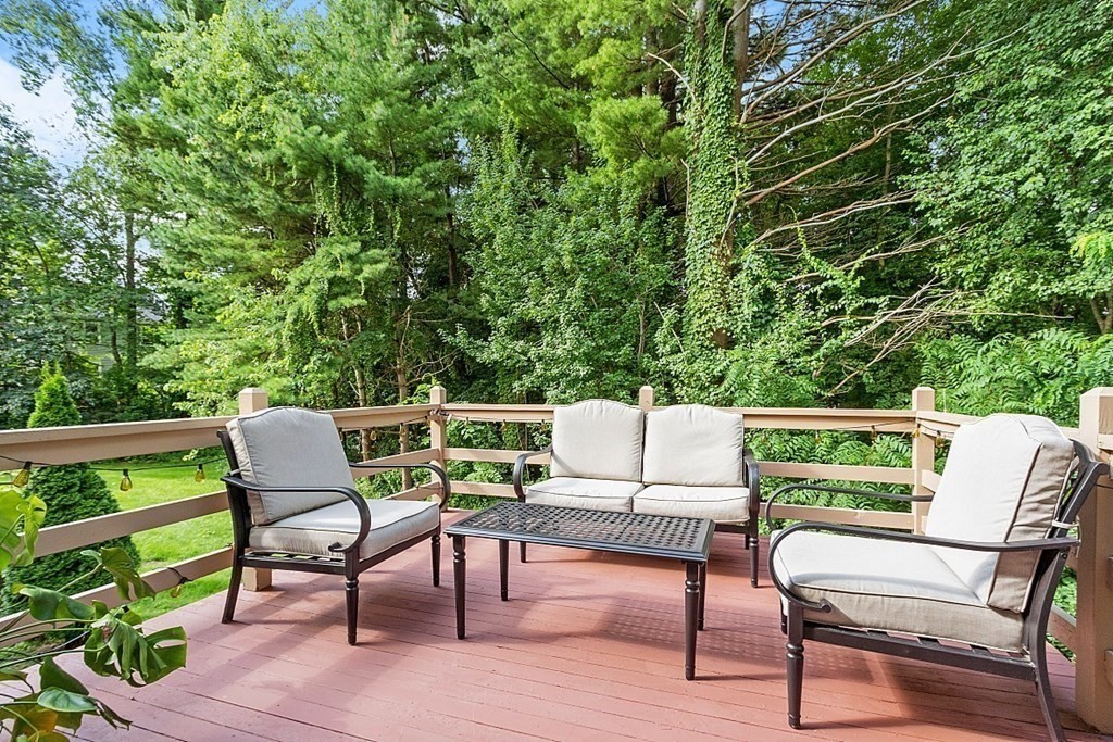 57 Stonegate Road, Unit 57 Chelmsford, MA 01824 - Photo 4 of 38 a balcony with furniture