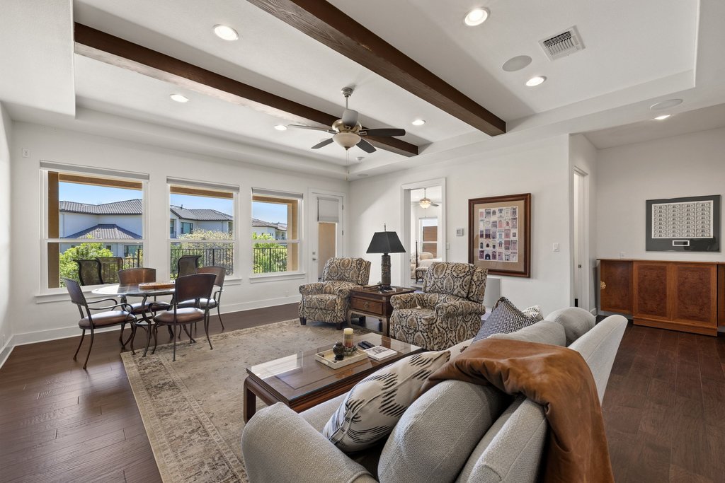 212 Marina View Way, Unit 11A Lakeway, TX 78734 - Photo 15 of 19 a living room with furniture and wooden floor