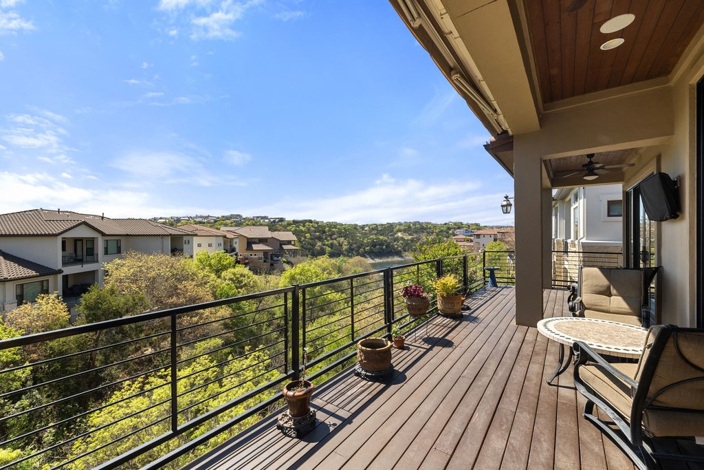 212 Marina View Way, Unit 11A Lakeway, TX 78734 - Photo 2 of 19 a view of a balcony with wooden floor space