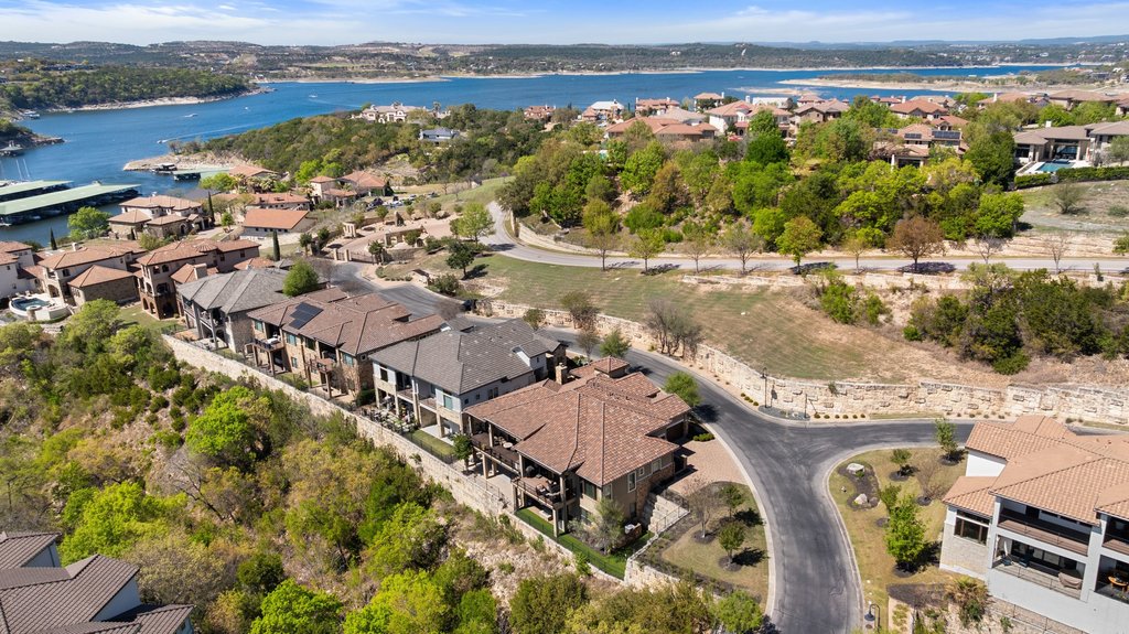 212 Marina View Way, Unit 11A Lakeway, TX 78734 - Photo 3 of 19 an aerial view of residential houses with outdoor space and ocean view