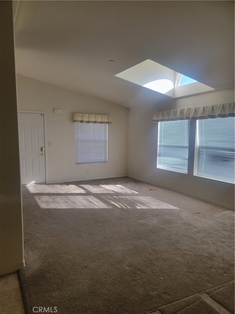 20230 Planada Court Riverside, CA 92508 - Photo 4 of 9 a view of empty room with windows