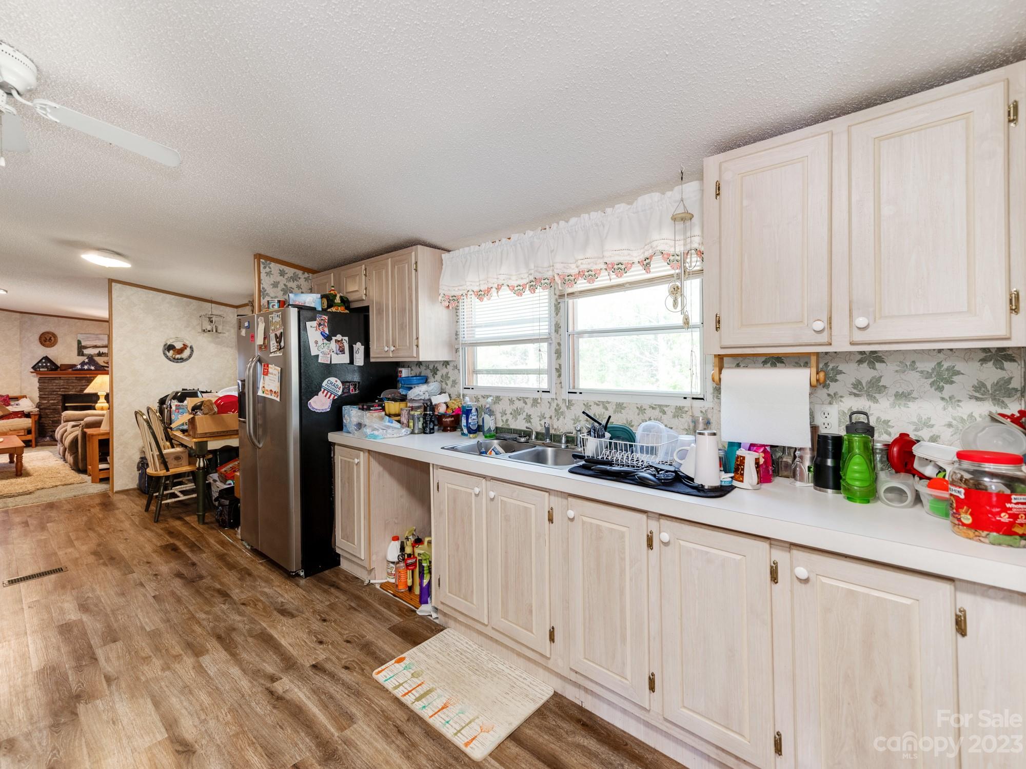 1168 Hopps Road Chester, SC 29706 - Photo 13 of 32 a kitchen with sink cabinets and window