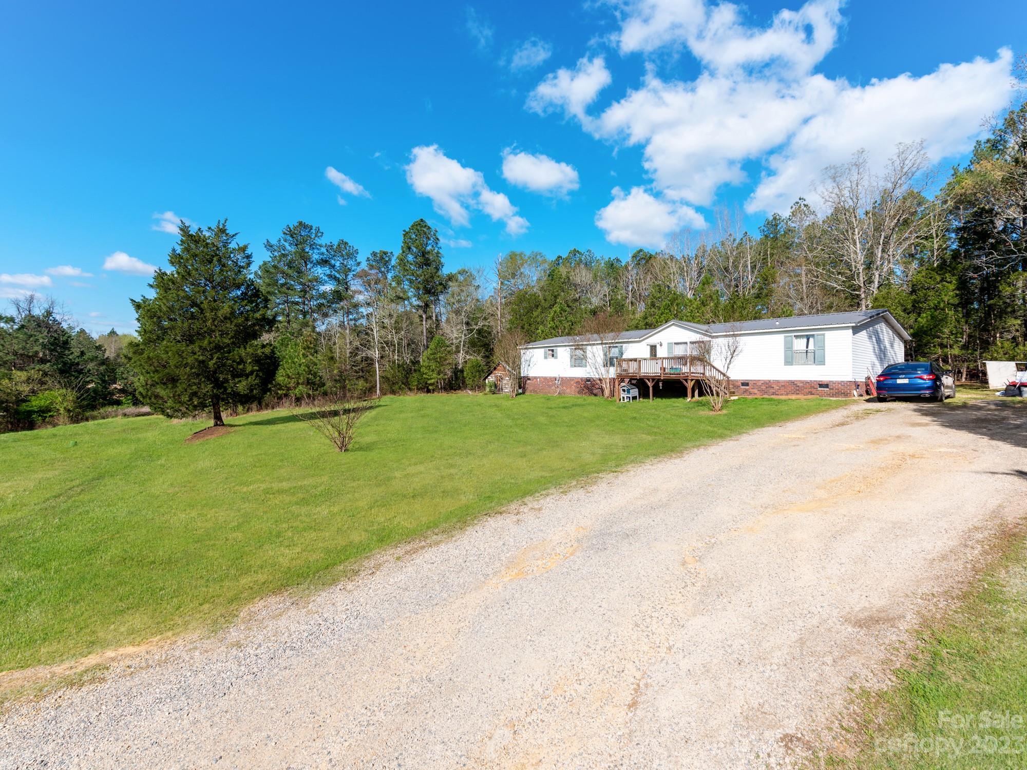 1168 Hopps Road Chester, SC 29706 - Photo 2 of 32 a view of a street with houses