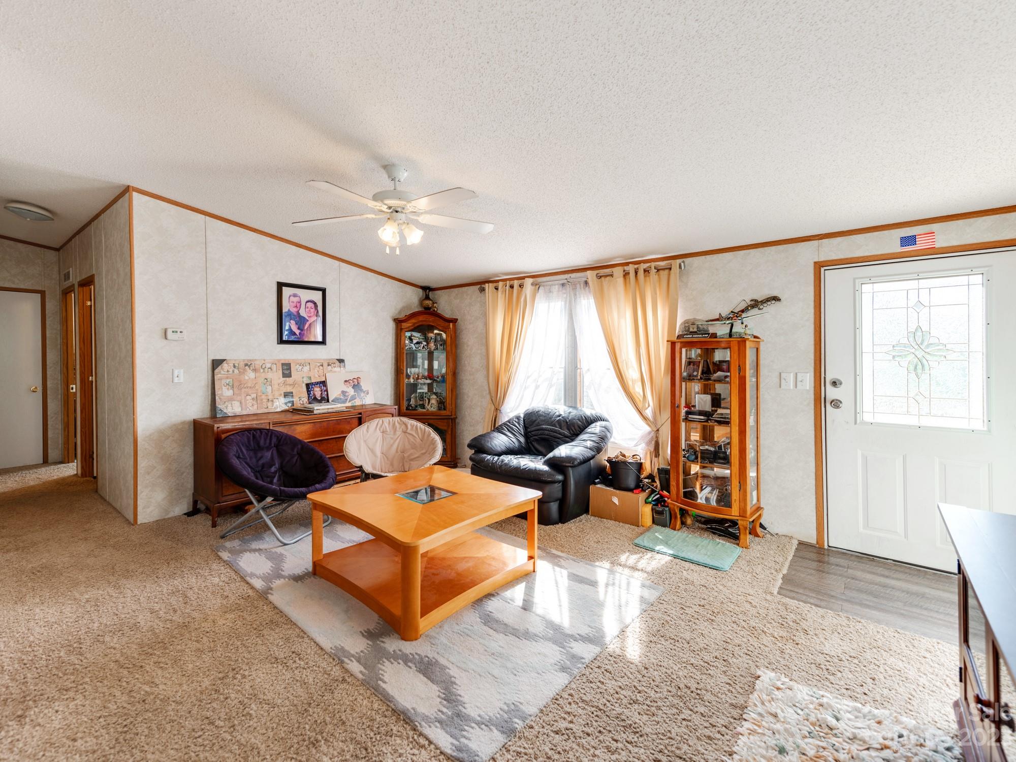 1168 Hopps Road Chester, SC 29706 - Photo 8 of 32 a bed room with furniture and a window