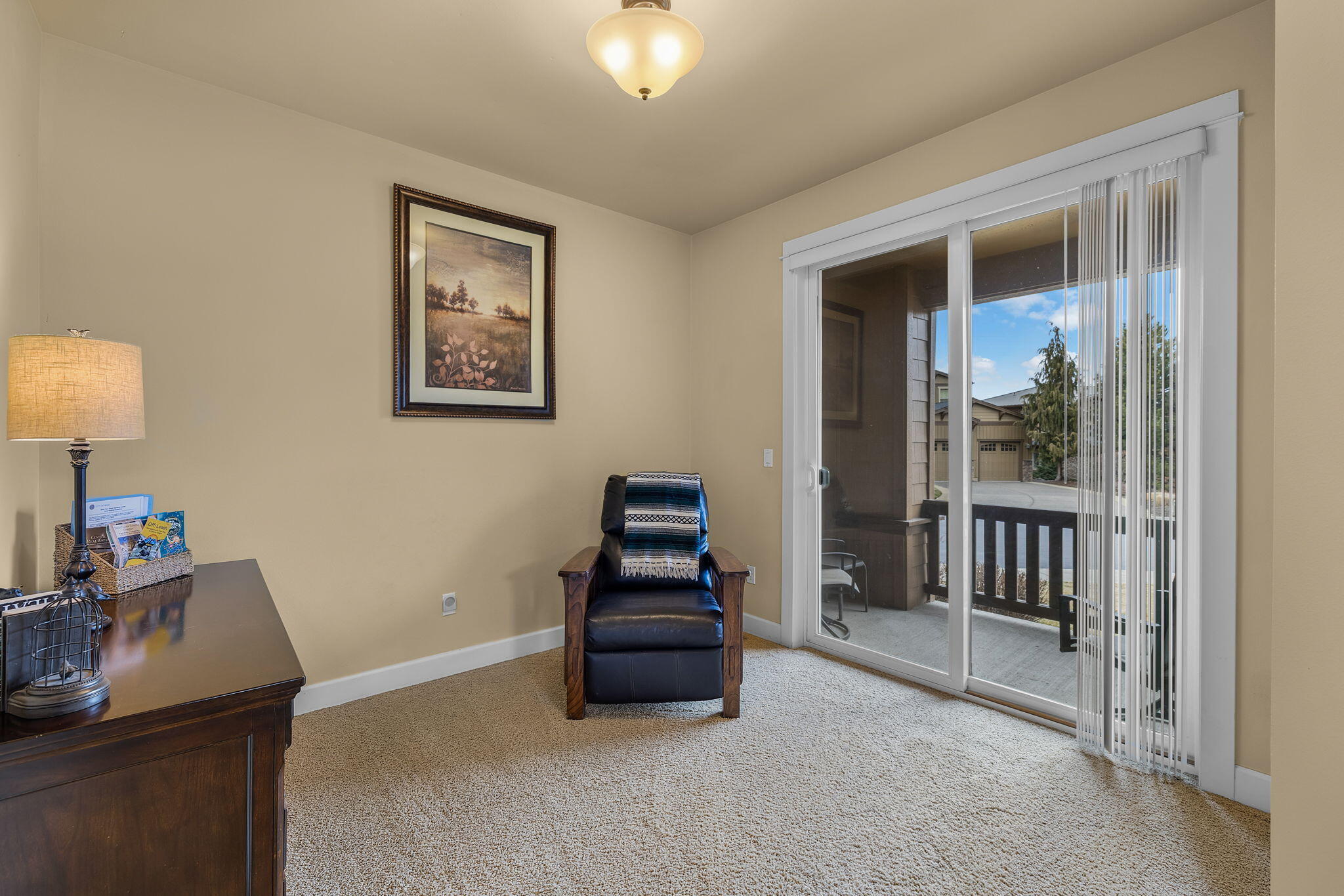 935 Southwest Chamberlain Street Bend, OR 97702 - Photo 13 of 33 Separate den with adjacent private patio.